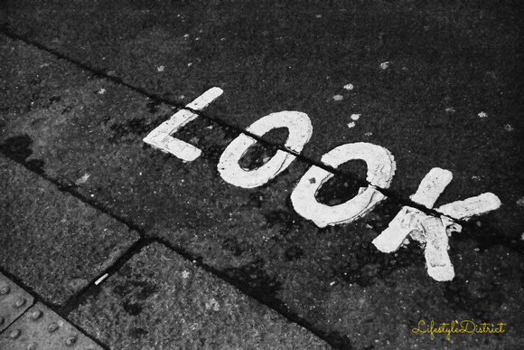 A look right sign painted on the road