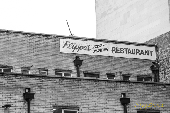 Old sign for Flipper, a fish and chips restaurant