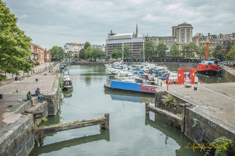 Two fishermen spending a lovely afternoon fishing in Bristol harbour
