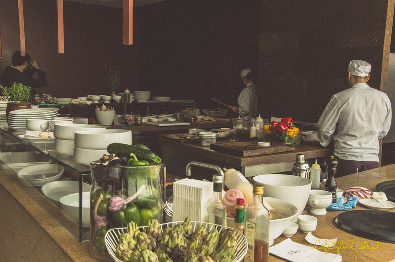 The open kitchen of the Oblix restaurant is a pleasure for the eyes
